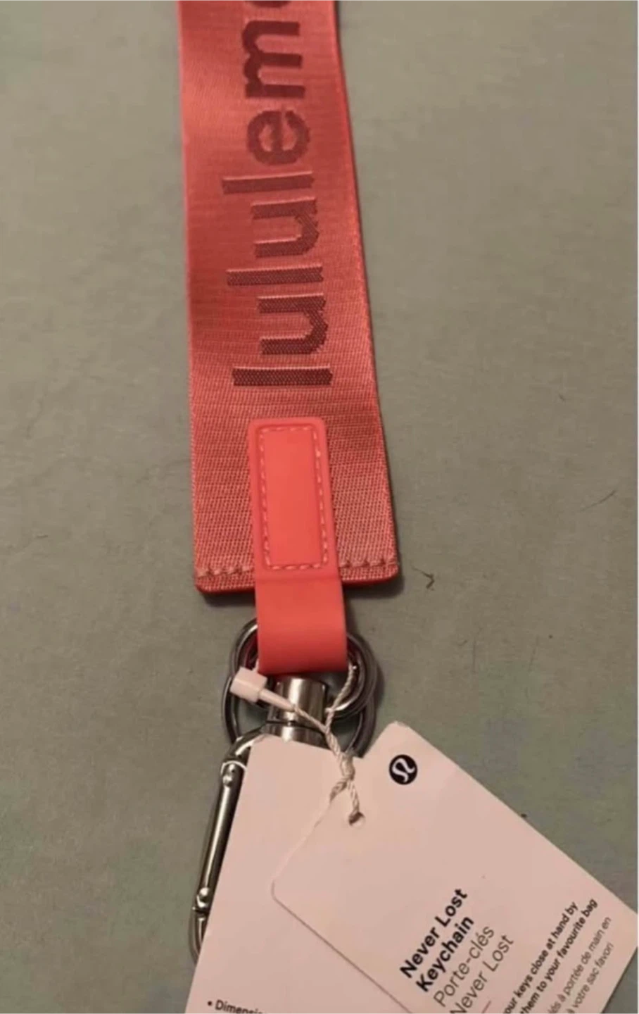 Lululemon raspberry cream keychain tags on