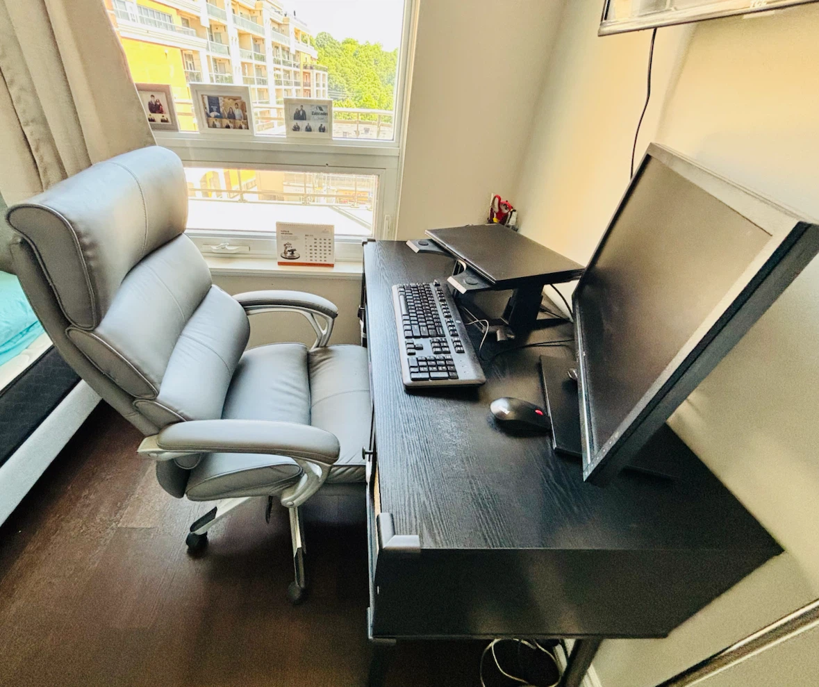 Grey Executive Office Chair and wooded table