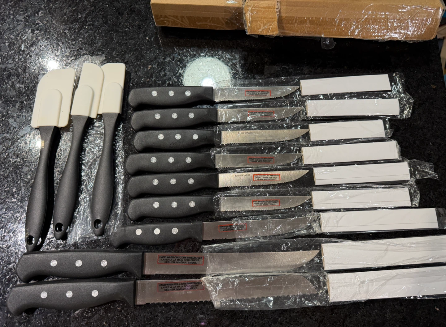 Moving sales: New Farberware Knives and Spatulas Set