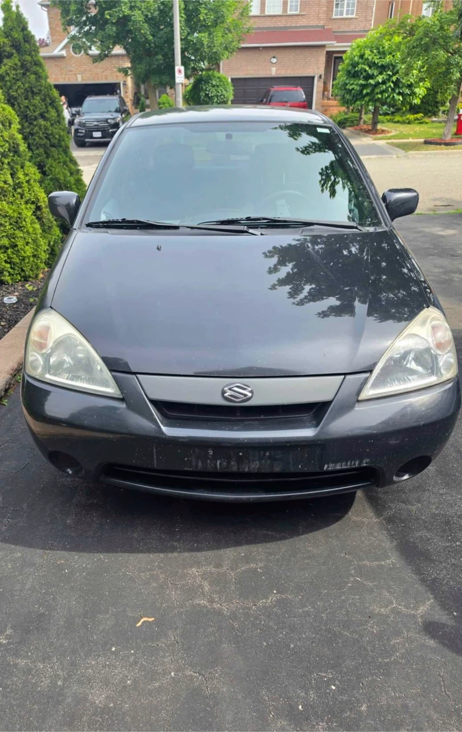 2002  Suzuki Aerio ( VERY LOW KM )