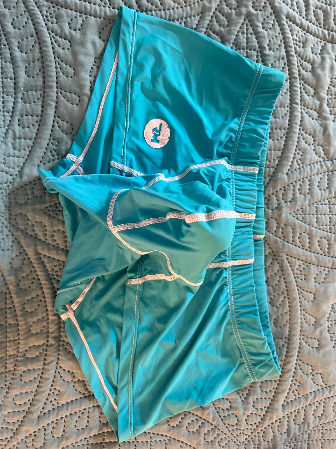 Teal Athletic Shorts with White Stitching