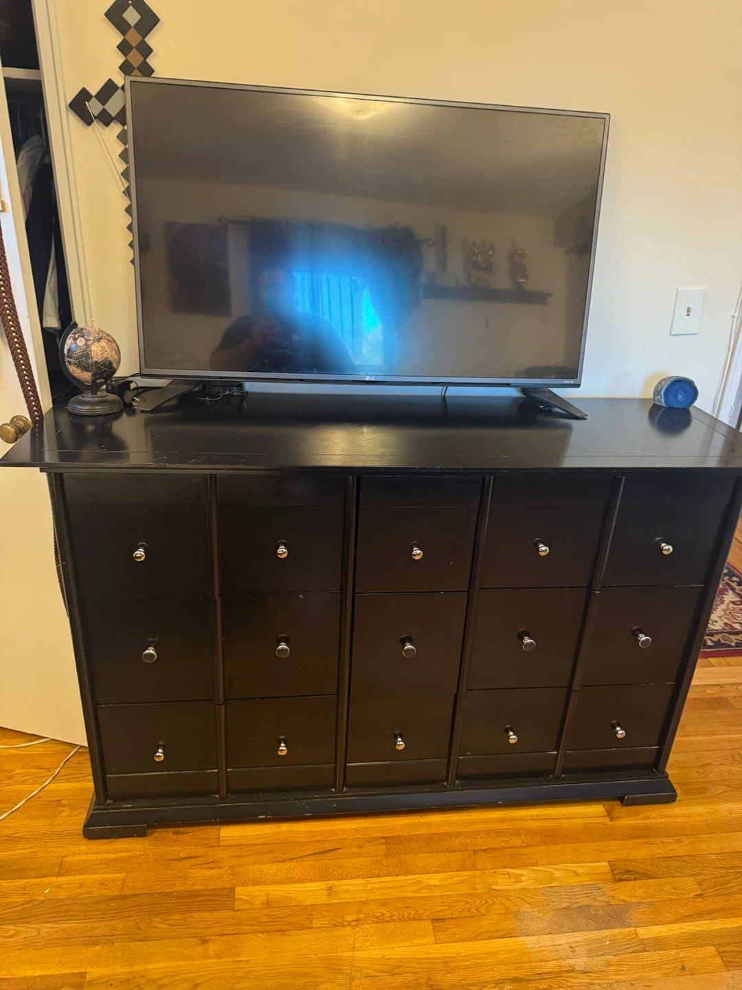 Black dresser with multiple draws and space - photo 2