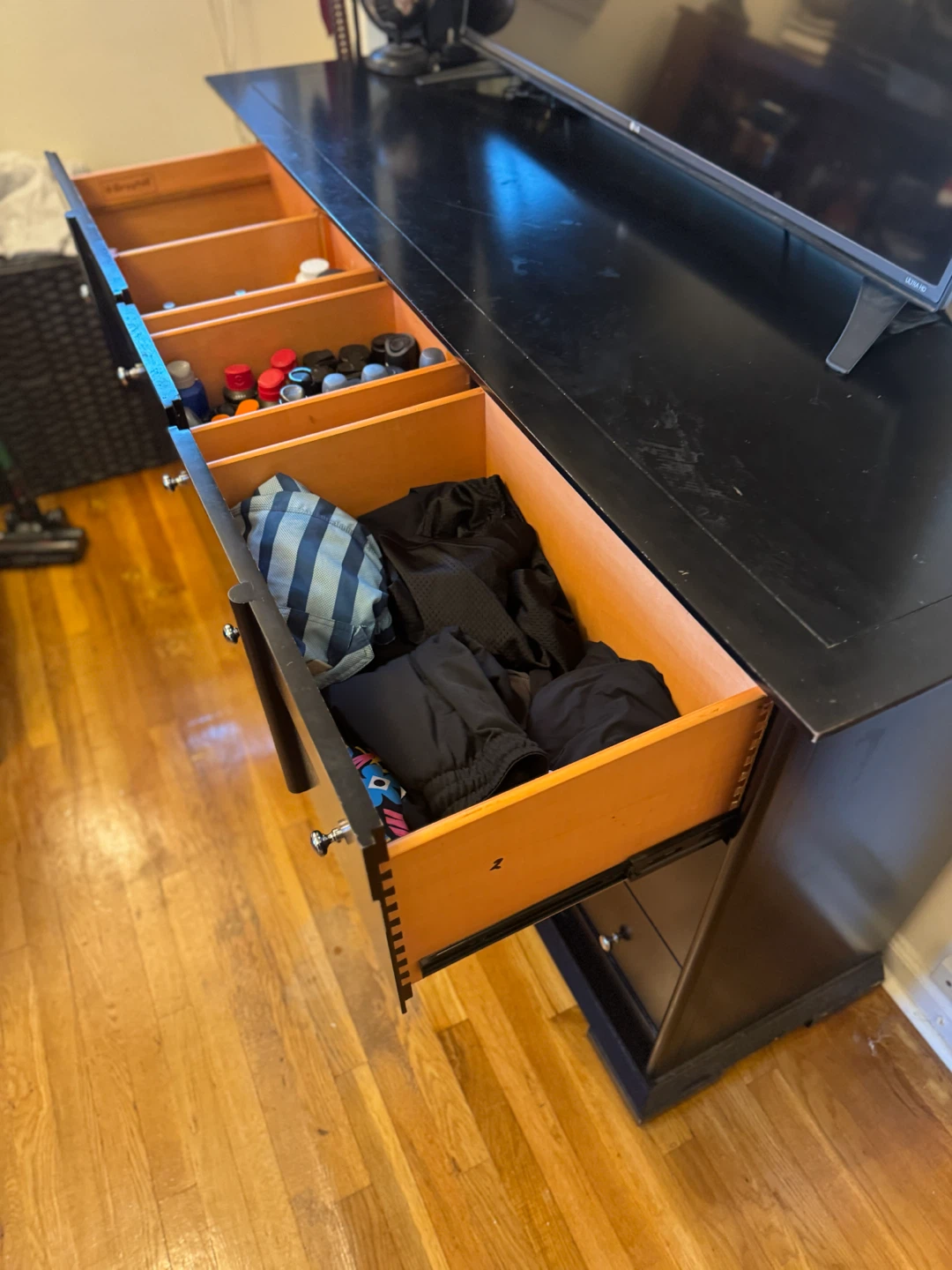 Black dresser with multiple draws and space - photo 3