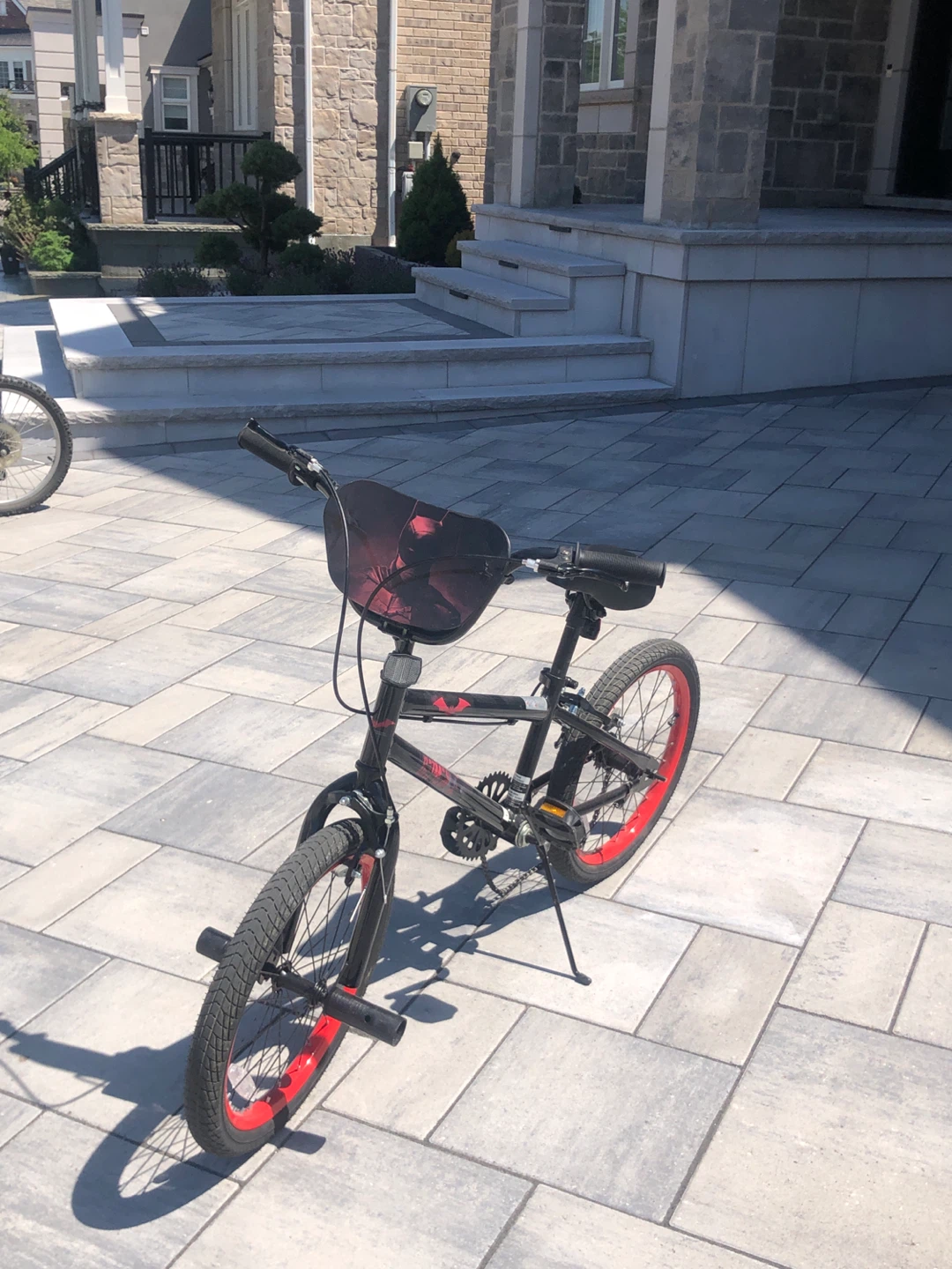 Black BMX Bike with Red Rims (Broken Chain)