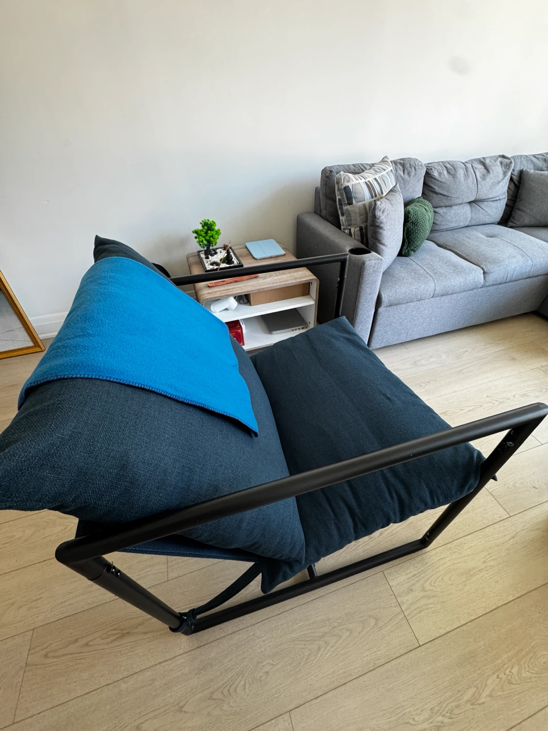 Modern Armchair with Blue Cushion