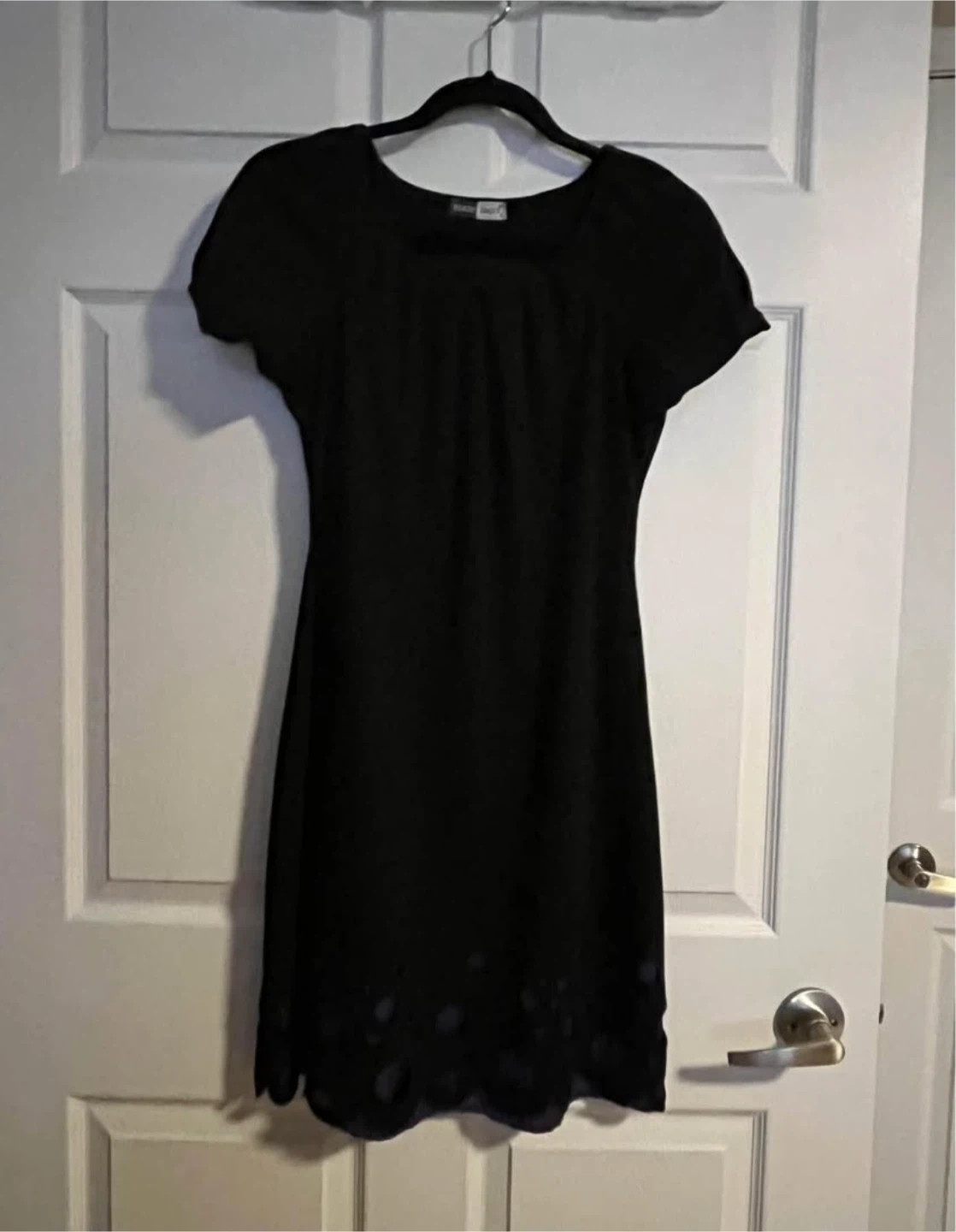 Black short-sleeve dress with cut-out detail