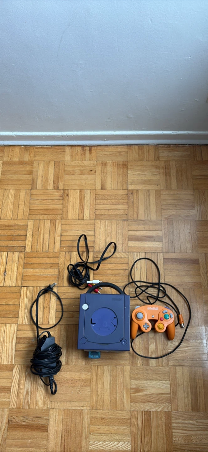 Nintendo GameCube Console with Orange Controller and Accessories