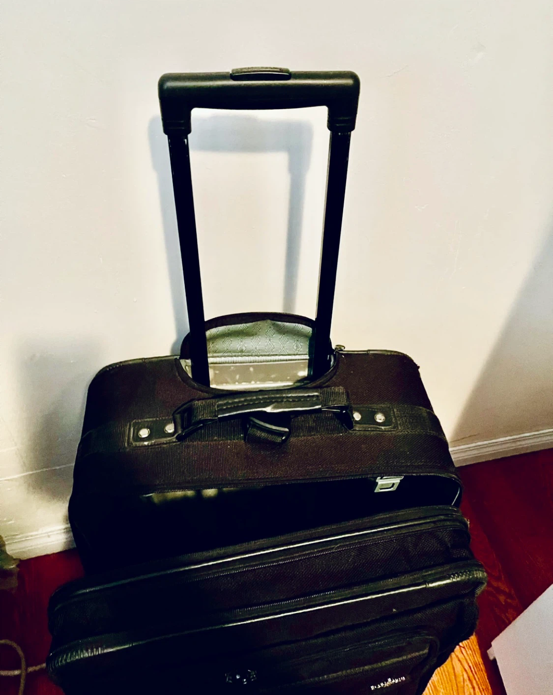 Travelpro Black Rolling Suitcase