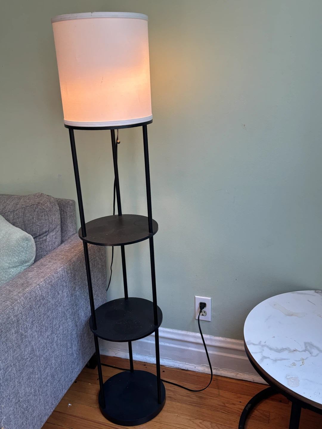Black floor lamp with shelves