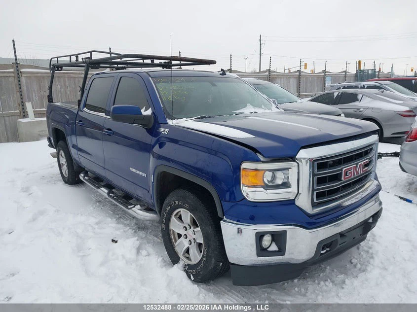 Blue GMC Sierra with Ladder Rack