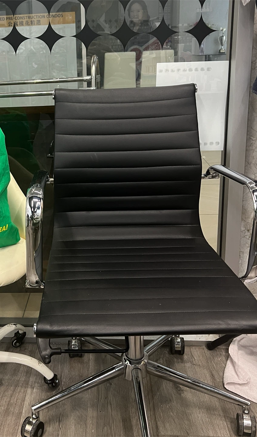 Black Ribbed Office Chair with Chrome Accents