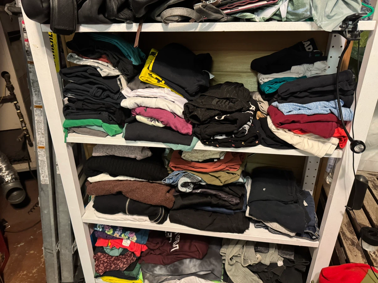 Assorted Clothing & Bags on Shelf