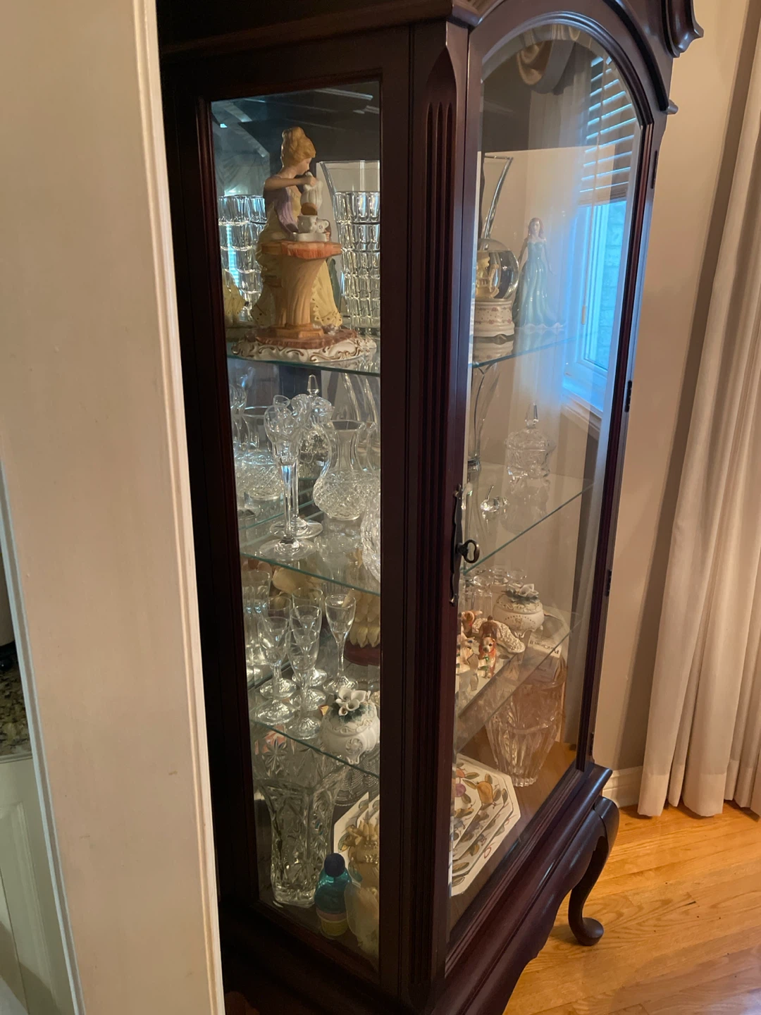 Wooden curio cabinet with glass doors - photo 2
