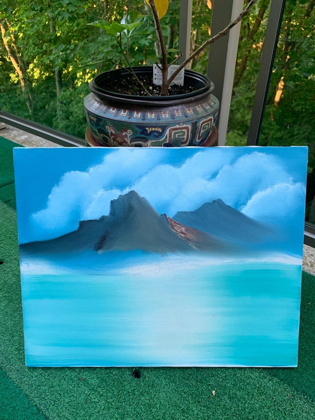 Landscape painting of mountains and water
