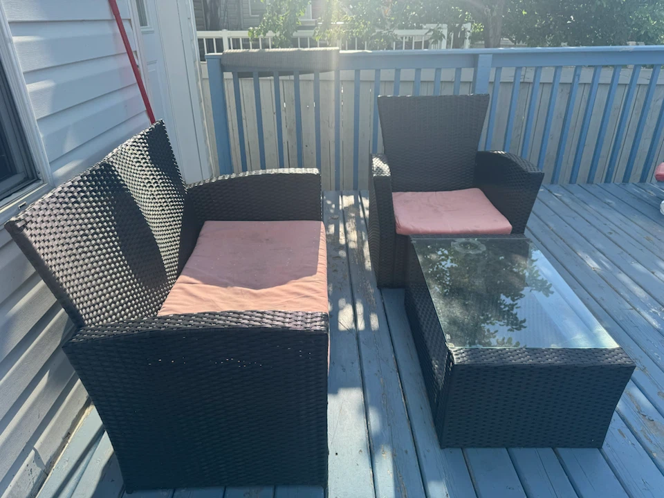 Wicker patio furniture set with table