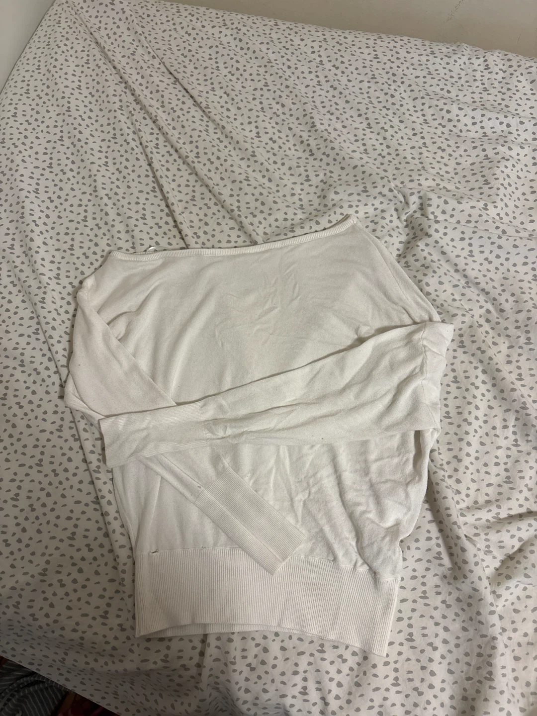 White long sleeve top off the shoulder and cropped