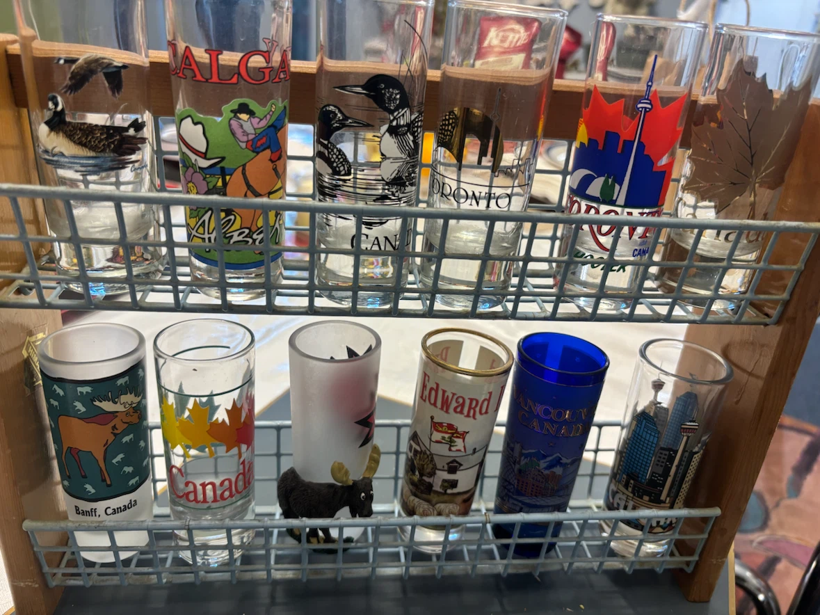 Set of 12 Vintage Canadian Shot Glasses with display rack