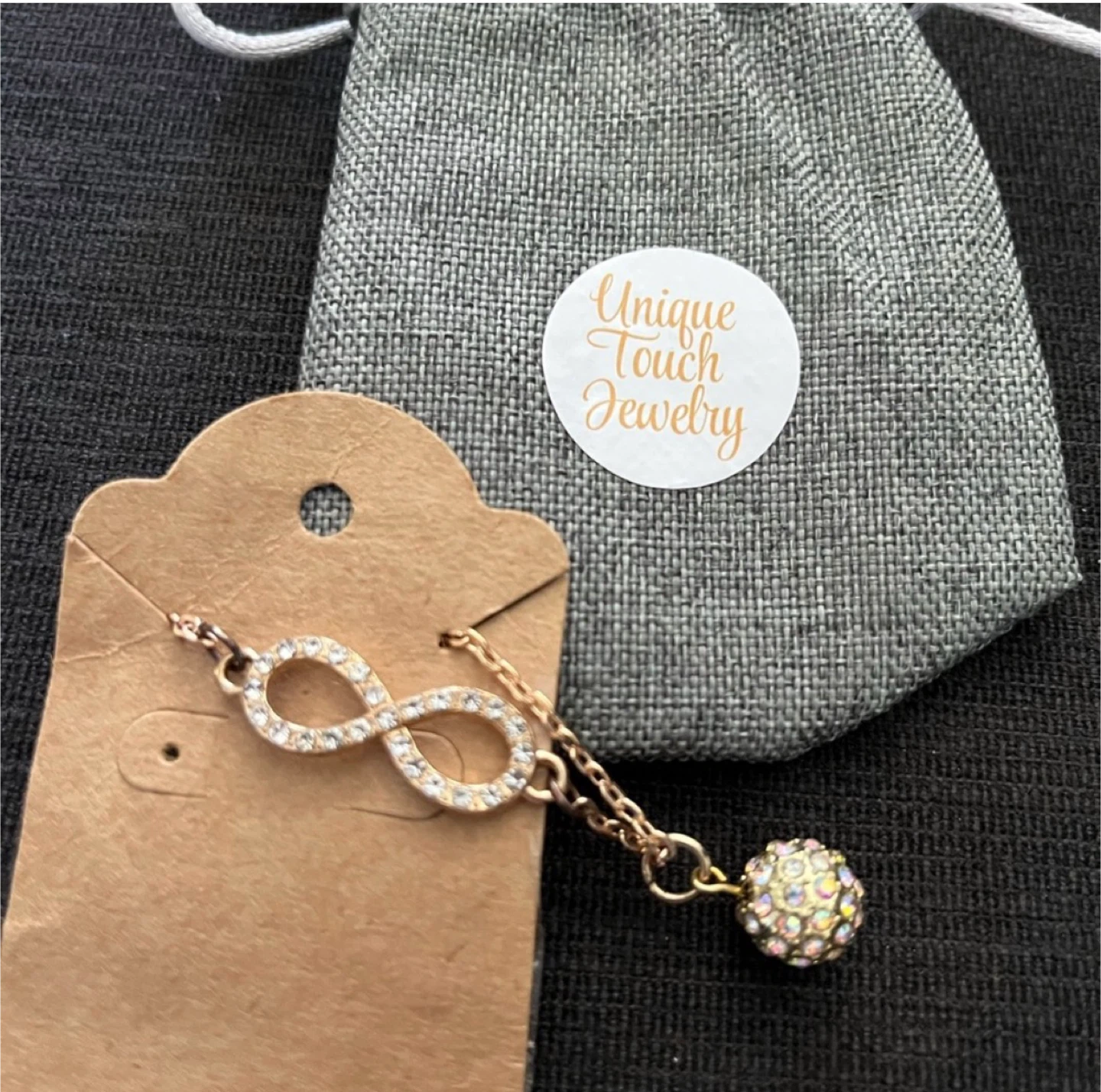 Infinity Charm Necklace with Sparkly Ball