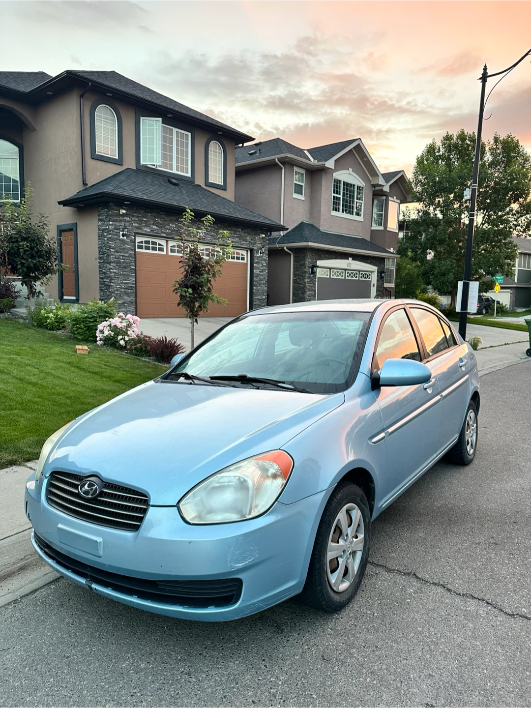 Light Blue Hyundai Accent Sedan