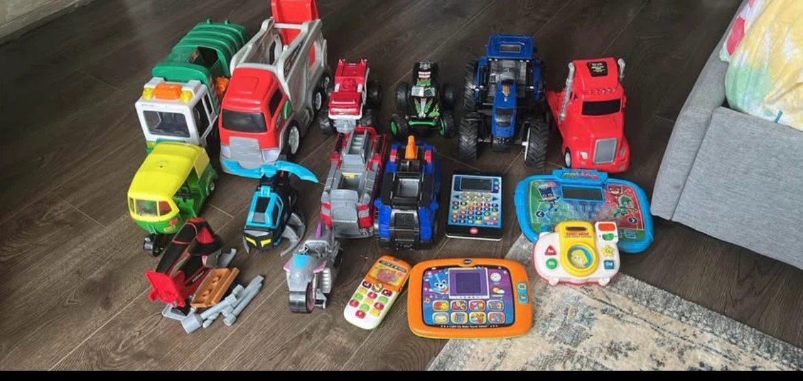Assorted Toy Vehicles and Learning Toys