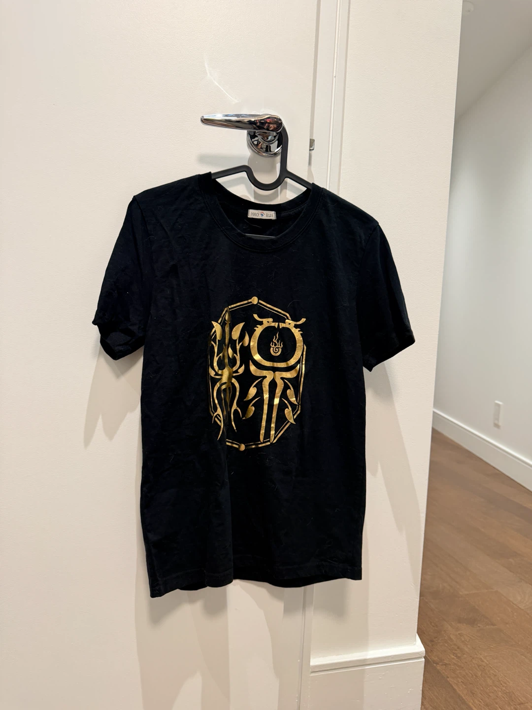 Black T-Shirt with Gold Graphic Print