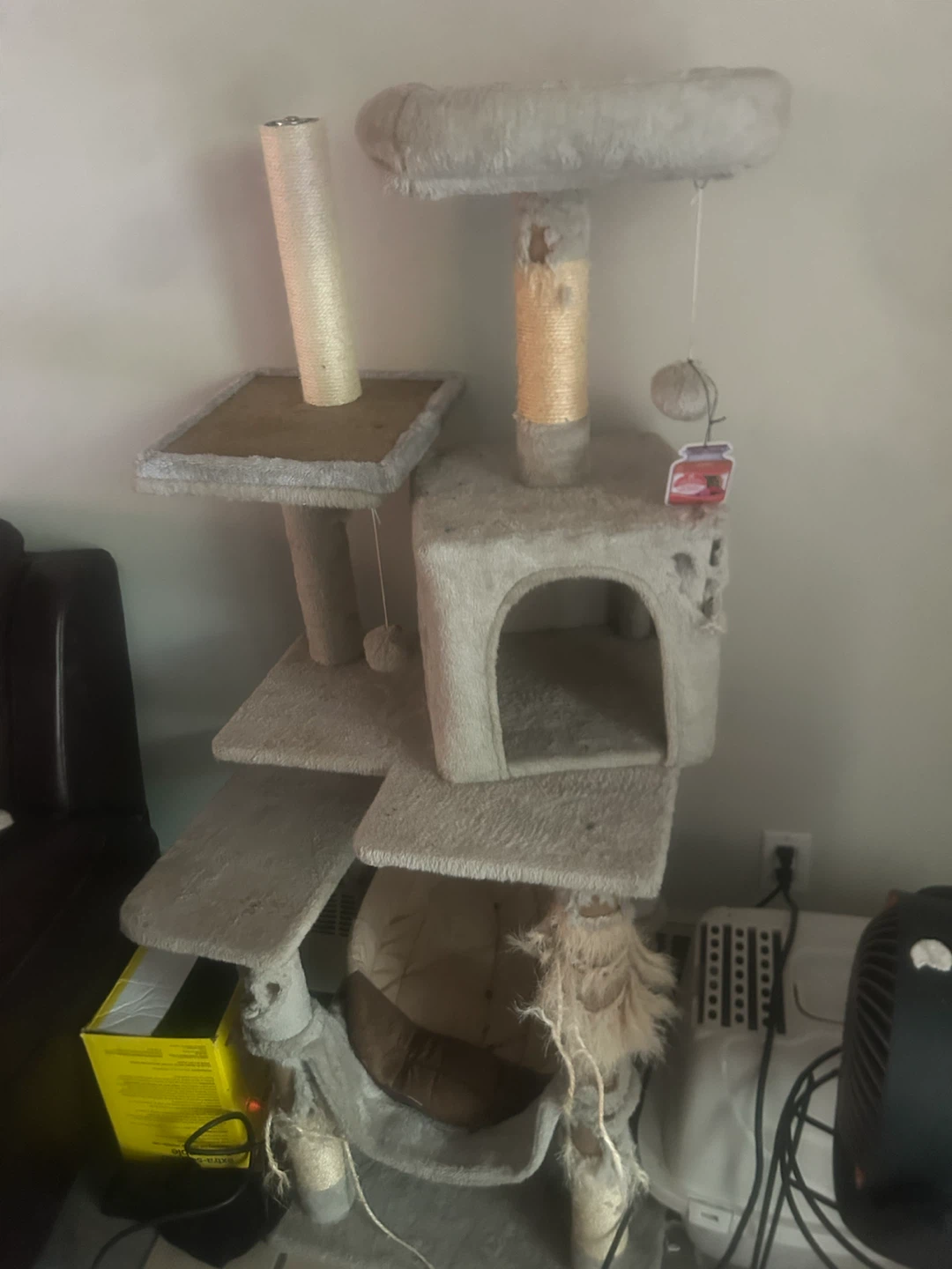 Well usedMulti-level Cat Tree with scratching posts