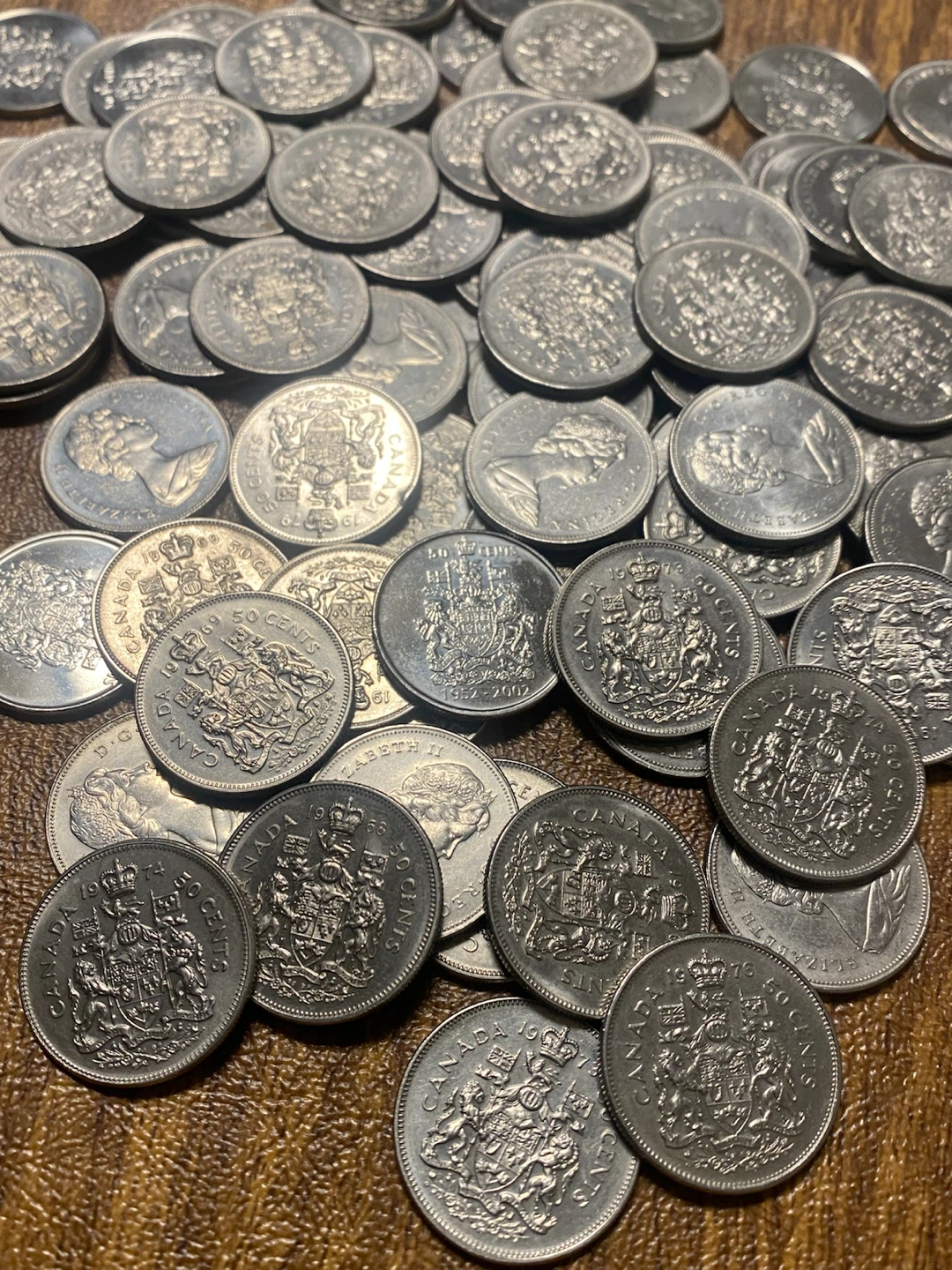 100 Assorted Canadian 50 Cent Coins