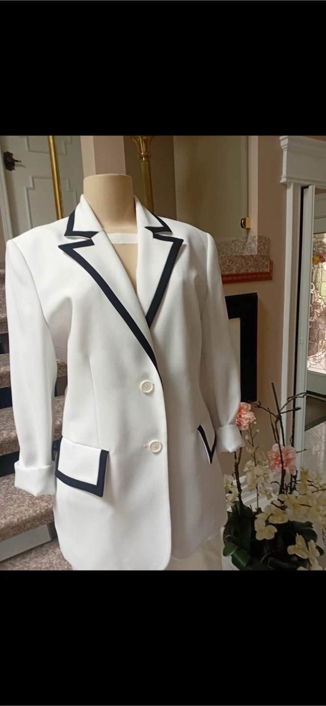 White blazer with black trim