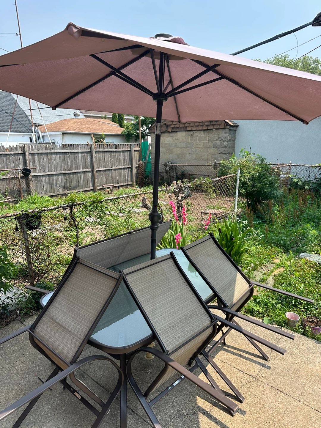 Glass Top Patio Dining Set with Umbrella