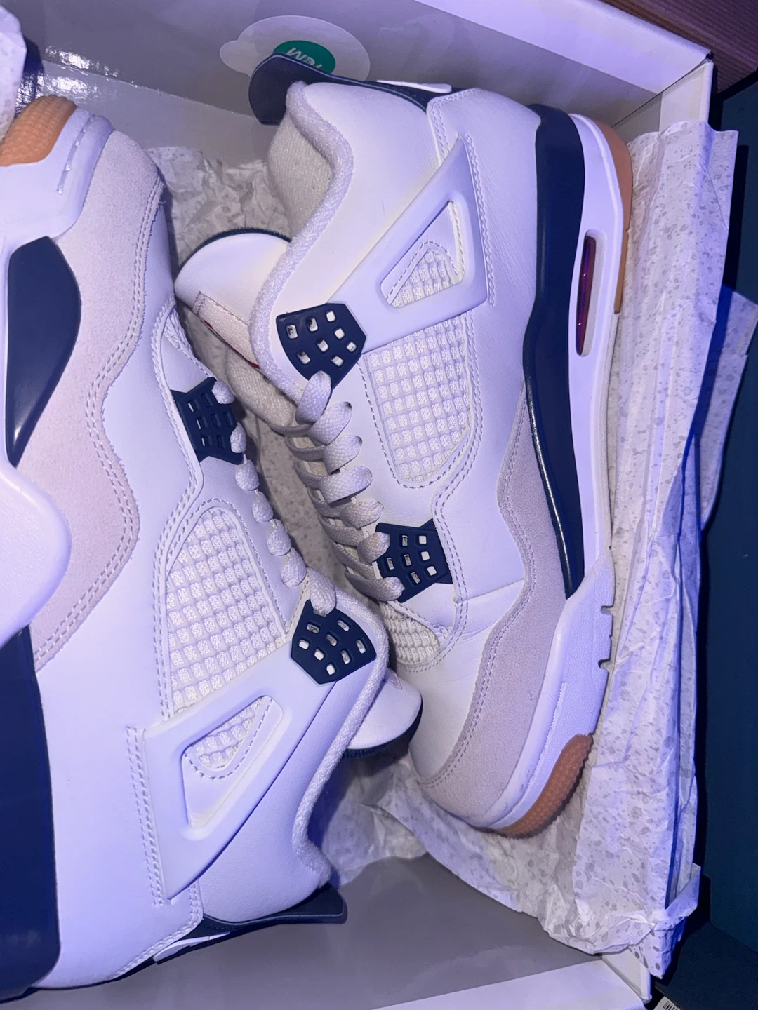 White and Navy Air Jordan 4 Sneakers