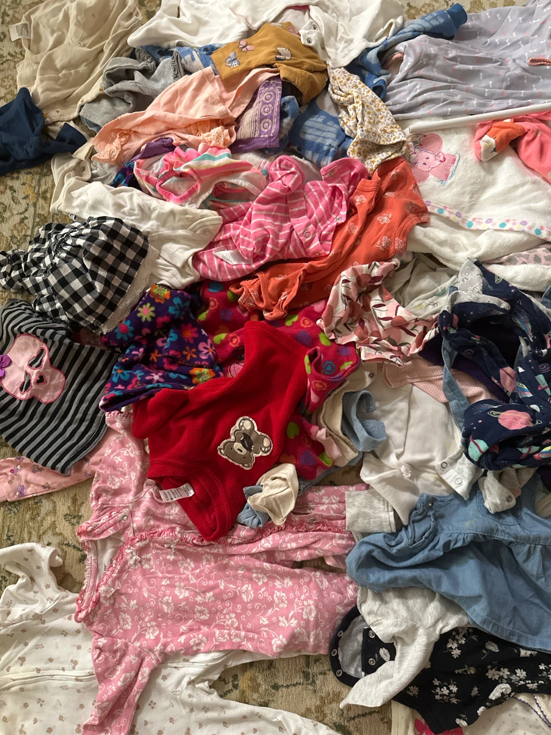 Bundle of assorted baby clothes