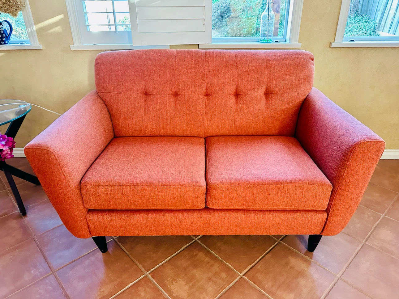 Orange 2-seater Sofa with H patterned Blanket - photo 2