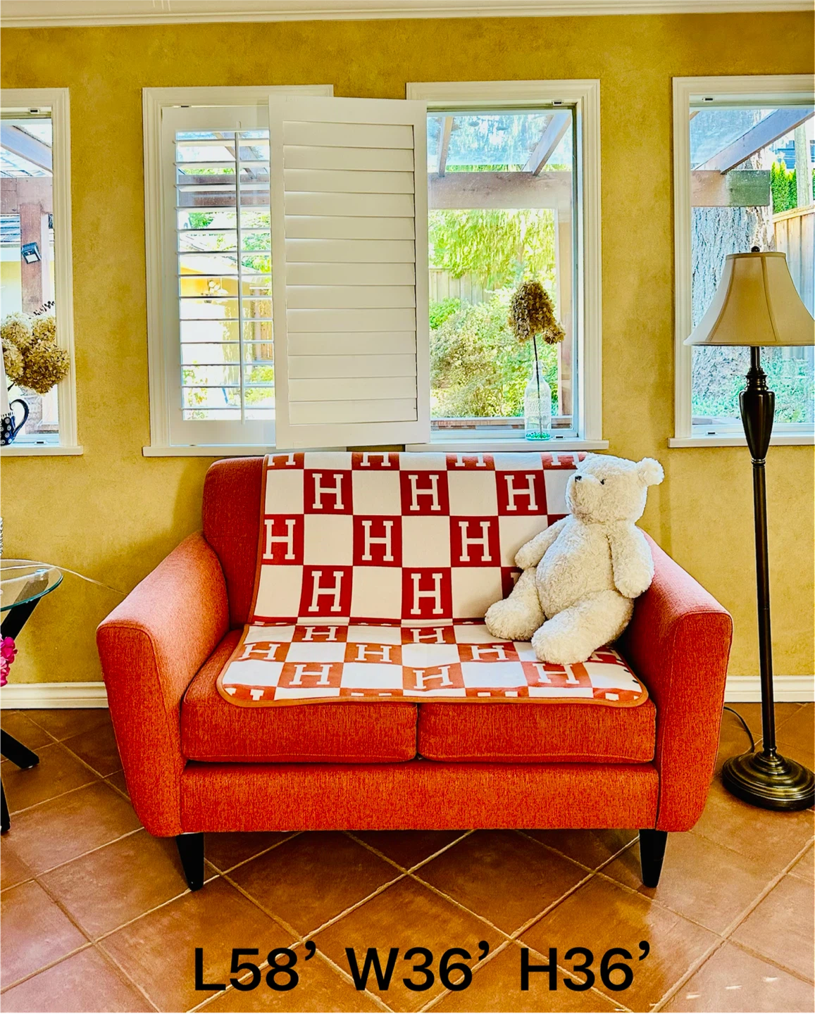 Orange 2-seater Sofa with H patterned Blanket - photo 3