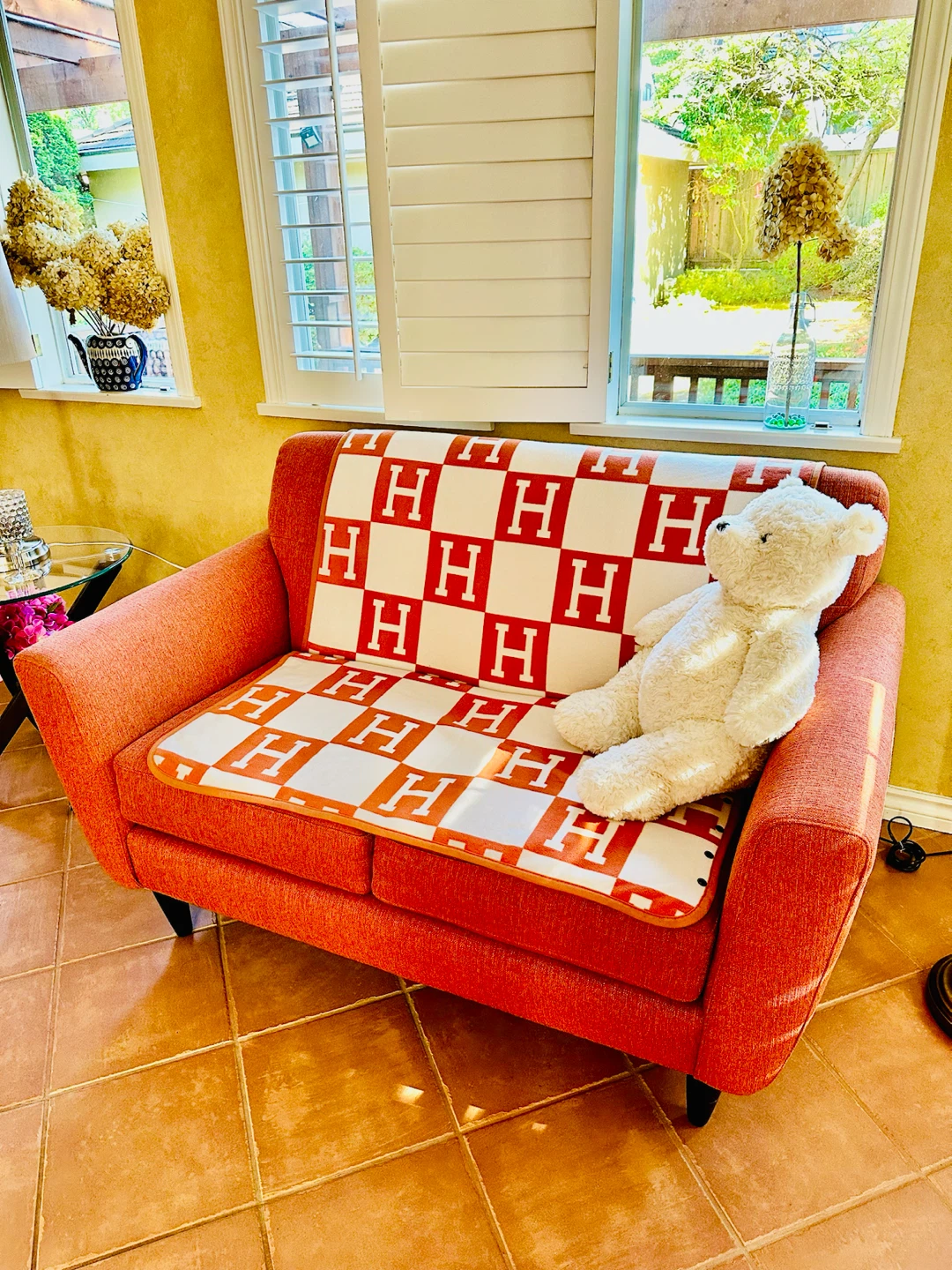 Orange 2-seater Sofa with H patterned Blanket - photo 4