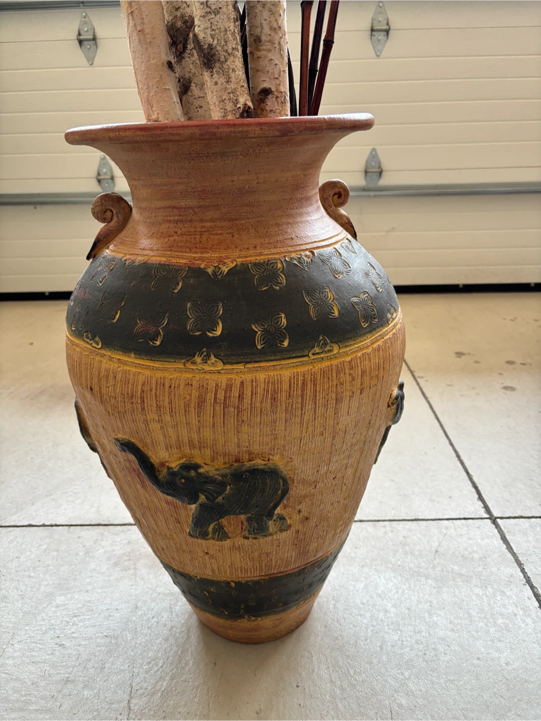 Large decorative vase with elephant design