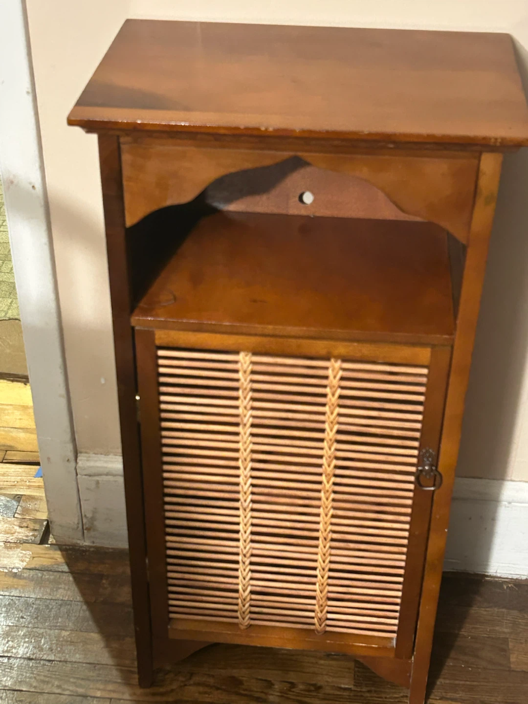 Wooden accent cabinet with slatted door