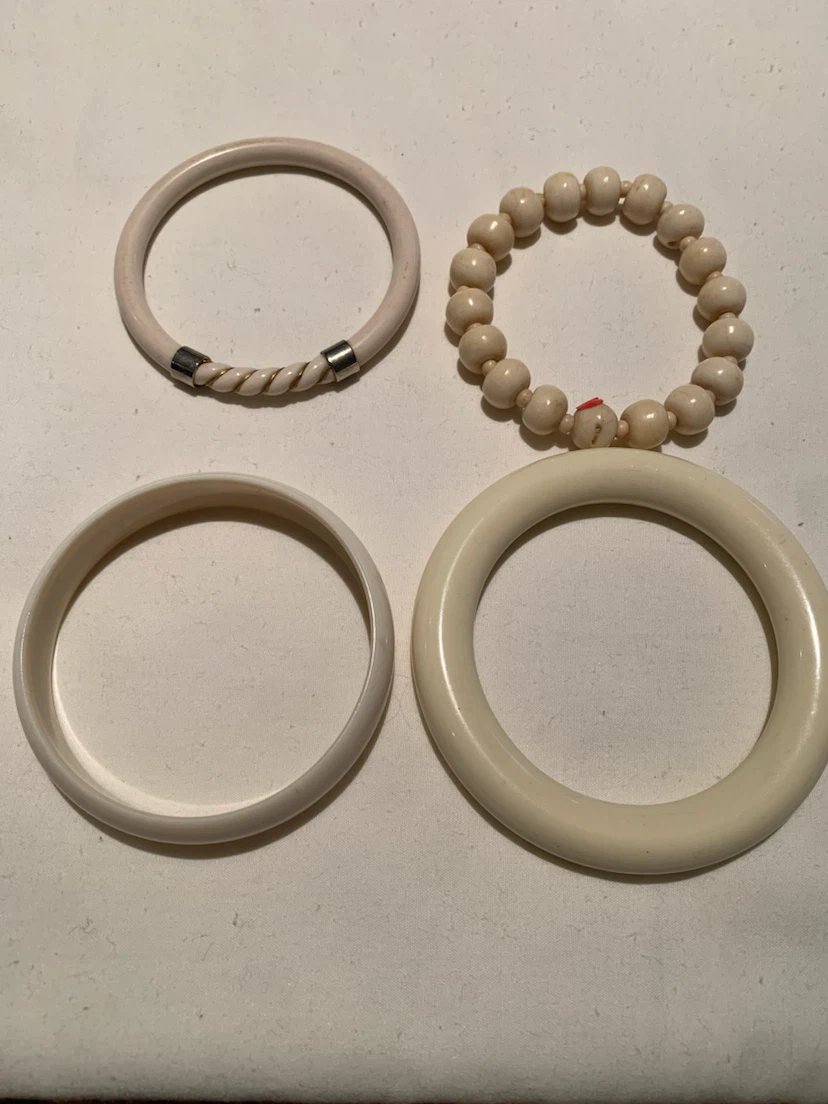 Set of 4 cream coloured bangles and bracelets