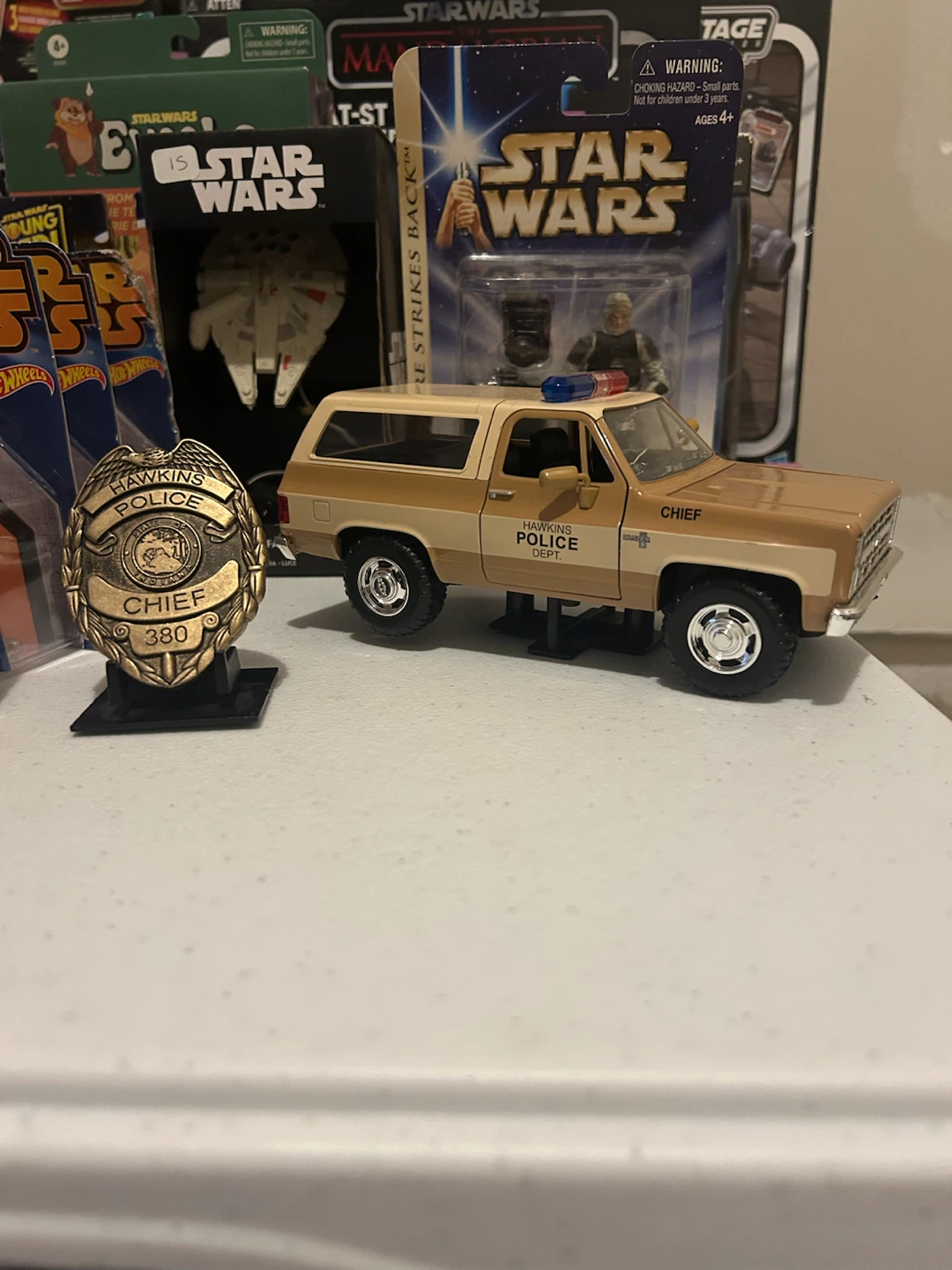 Stranger things car and badge collectible