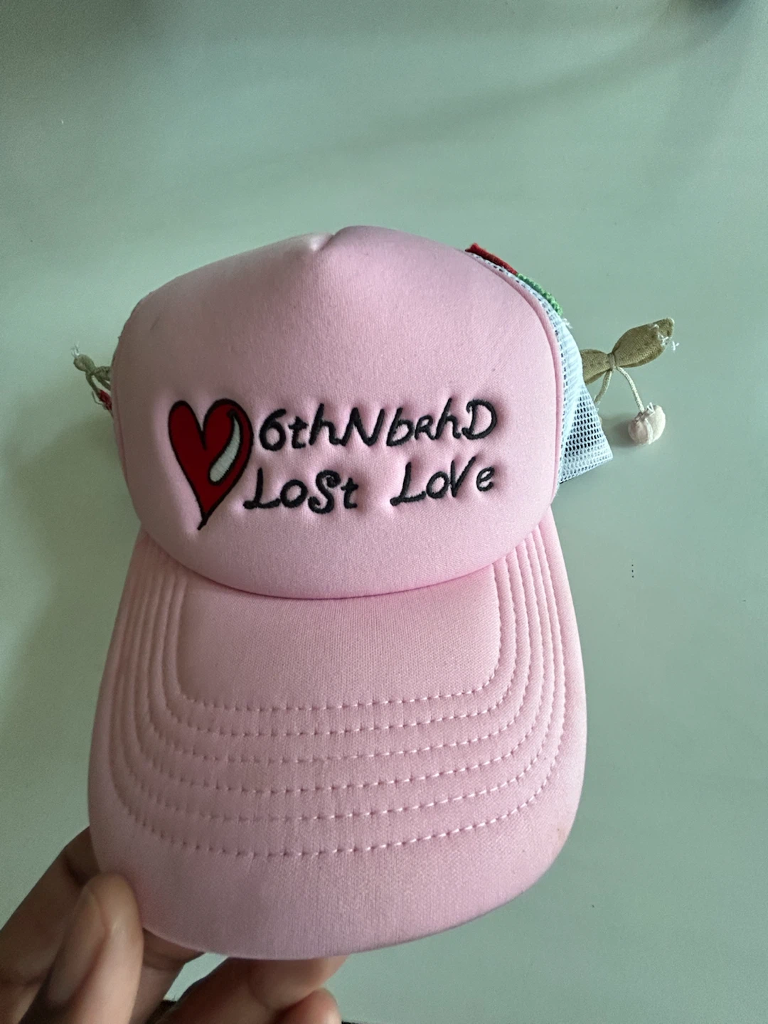 6thNbhD Lost Love Pink Trucker Hat