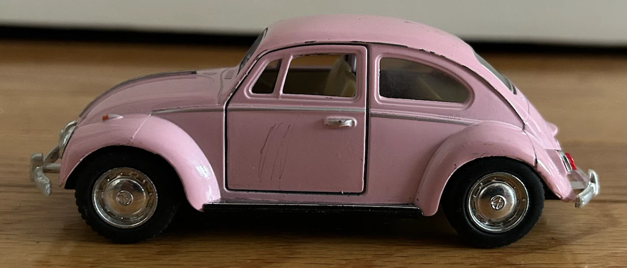 Pink Volkswagen Beetle Toy Car