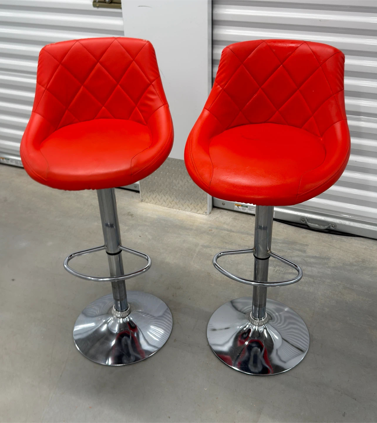 Pair of Adjustable Red Swivel Bar Stools
