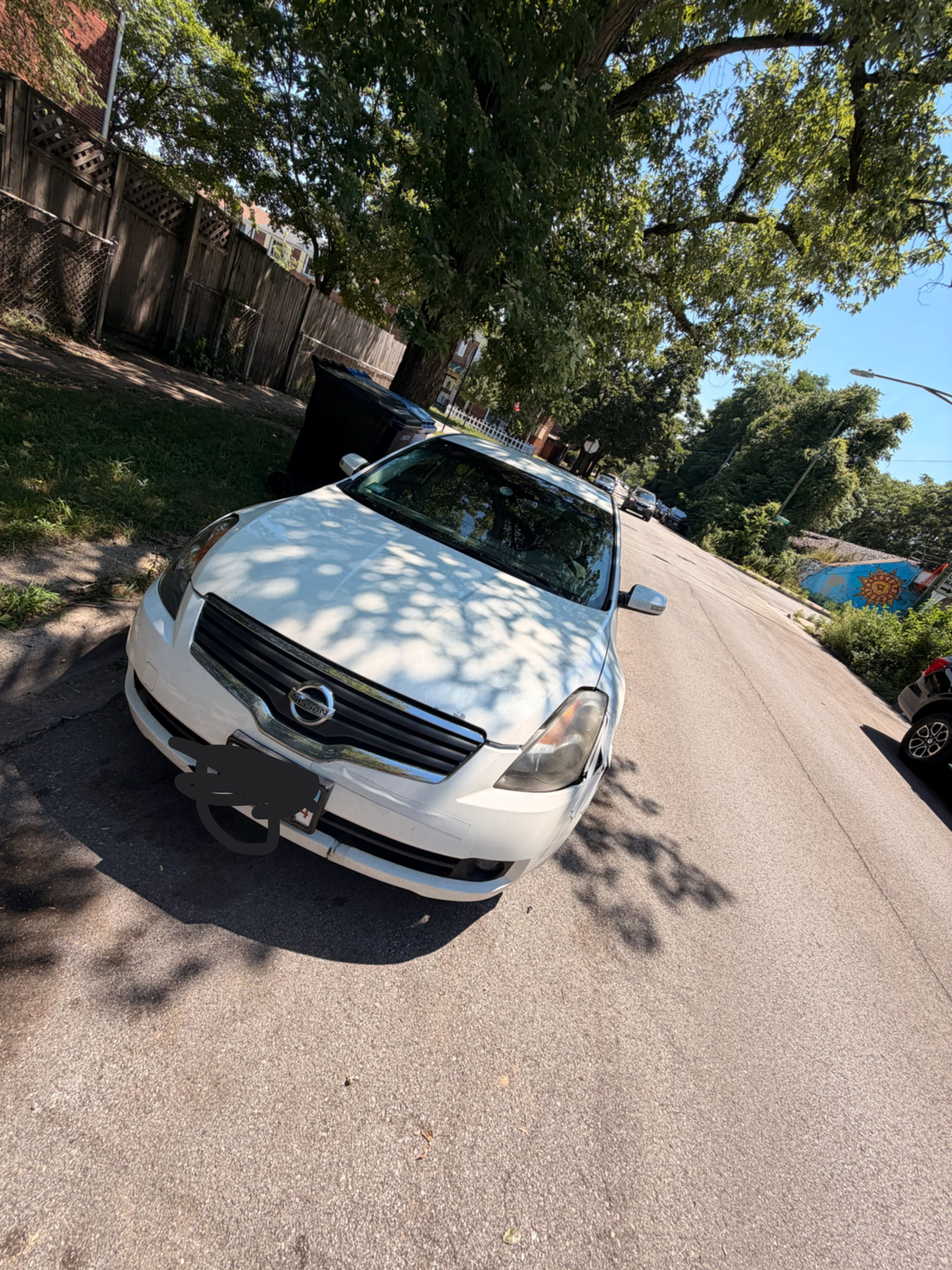 White Nissan Altima