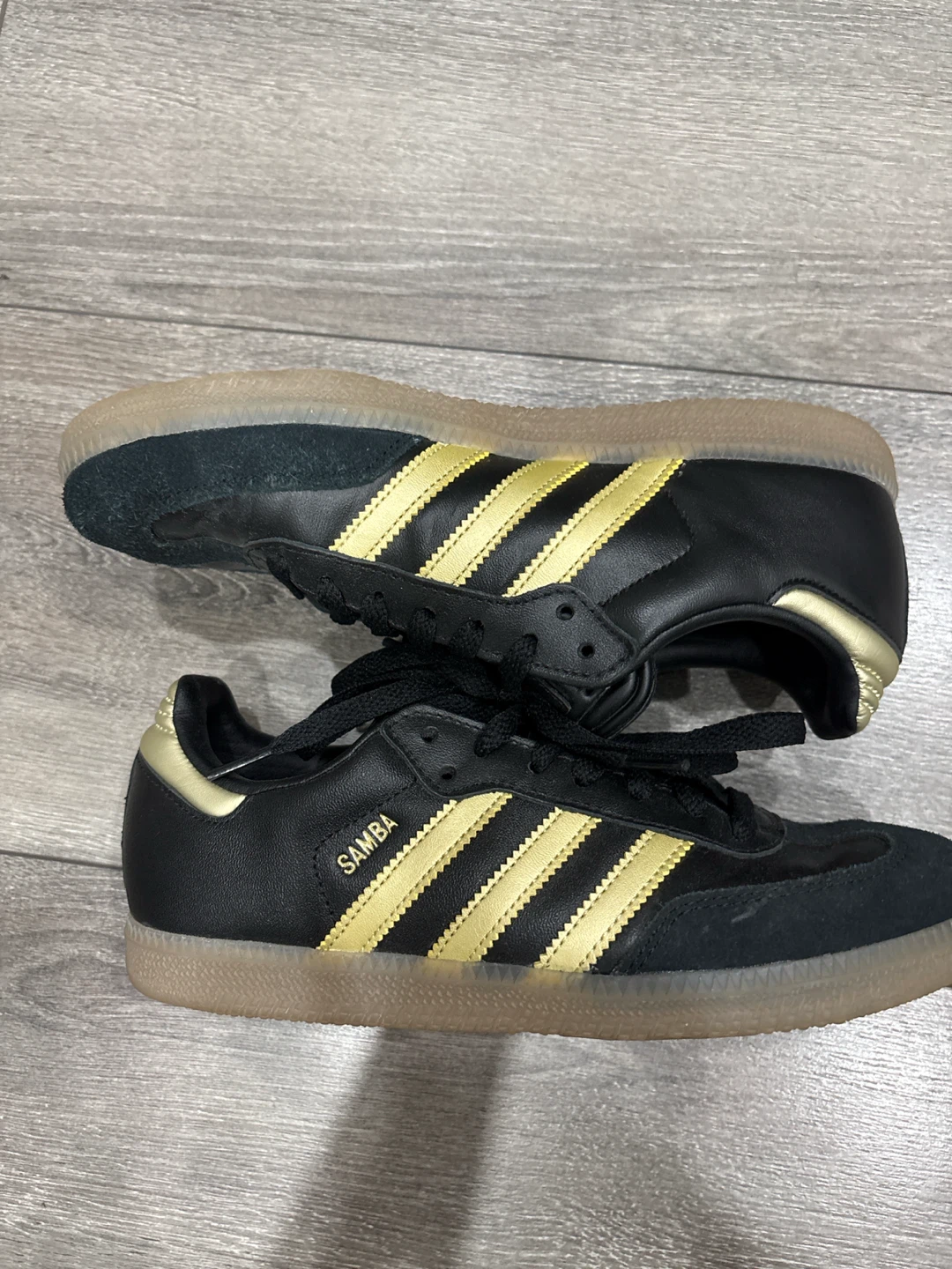 Adidas black and gold sambas size 5
