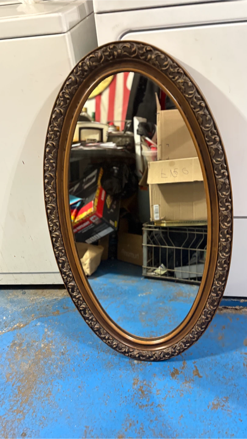 1979 Hollywood Regency style oval accent mirror