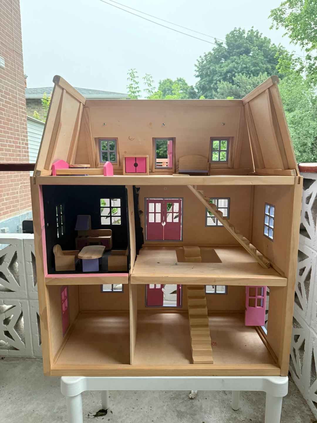 Wooden Dollhouse with Pink Accents