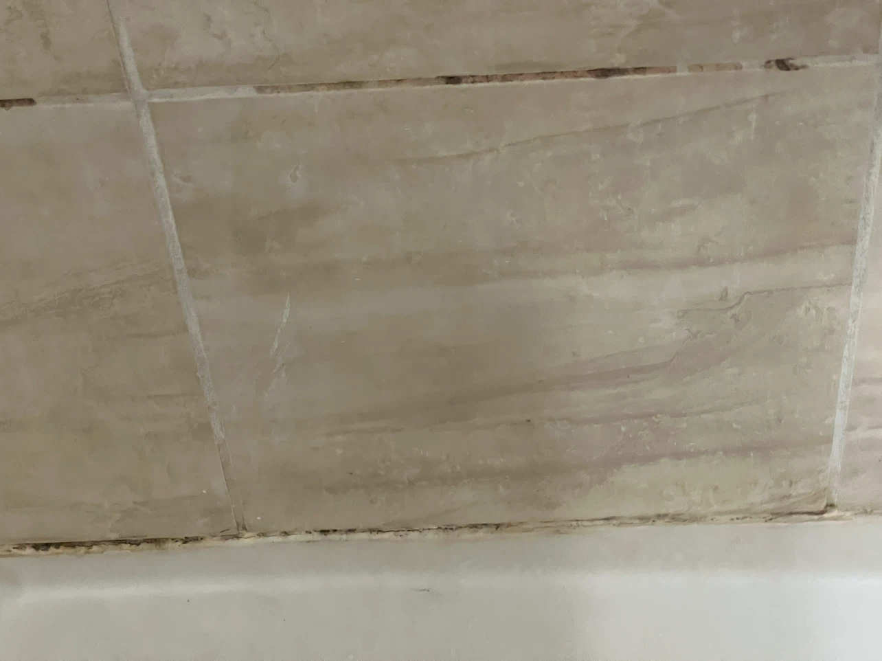 Bathroom caulking clean up - photo 3