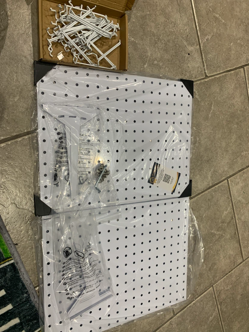 White Pegboard Display Stand with Hooks