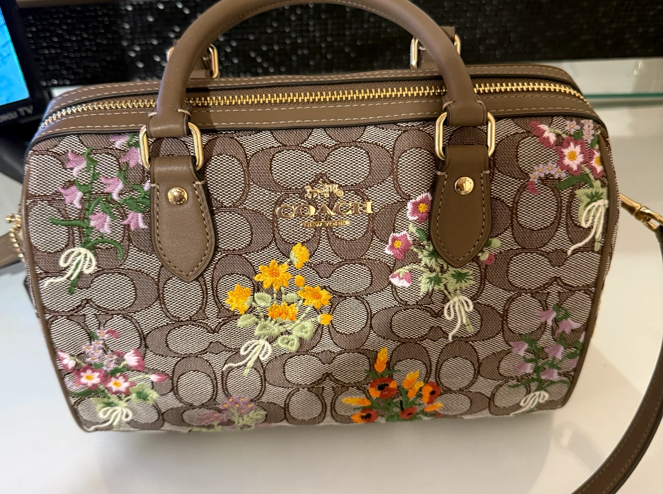Coach Rowan embroidered satchel bag.
