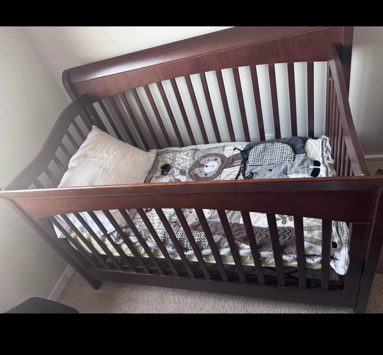 Wooden Crib with Animal Bedding