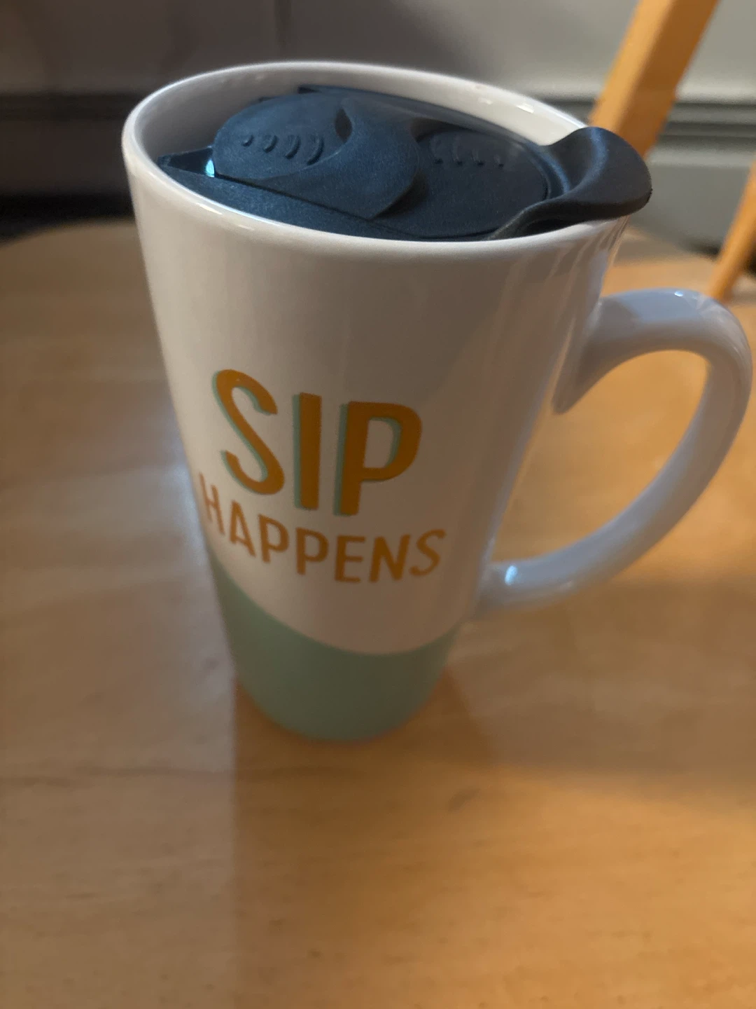 Travel Mug with "SIP HAPPENS" design